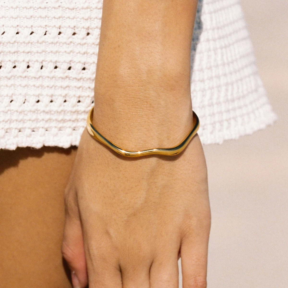 Cala Cuff - reviewed gold-color source photograph
