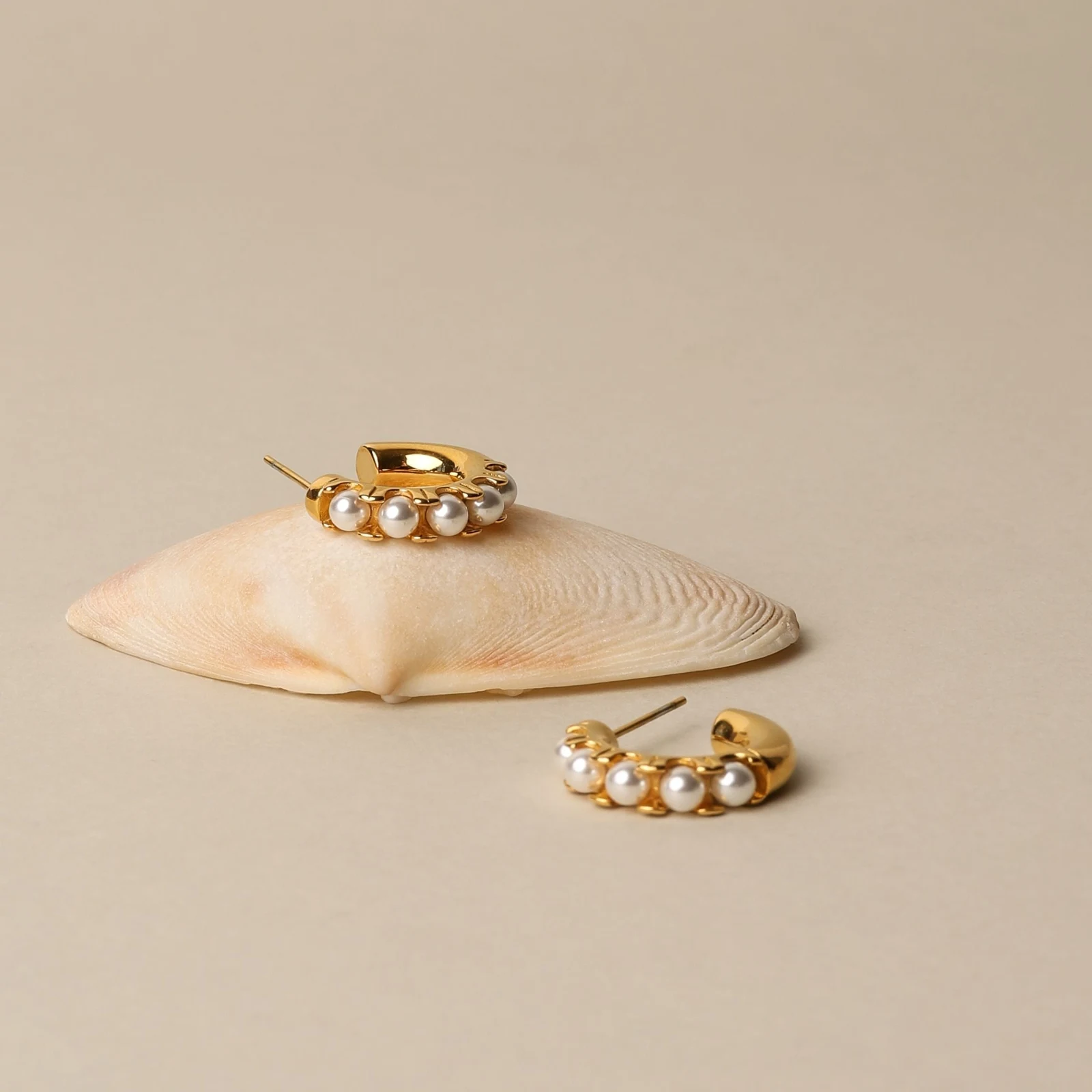 Mini Pearl Huggies Earrings - reviewed gold-color source photograph