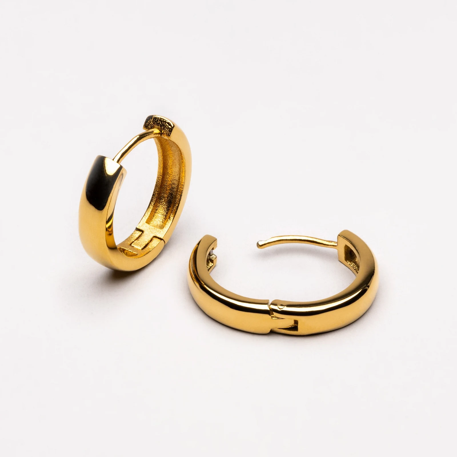 Bold Huggie Hoops - lead view
