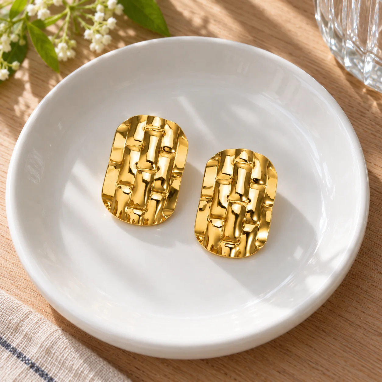 EH060 gold-colored woven rectangular stud earrings: alternate view; other styling items not included