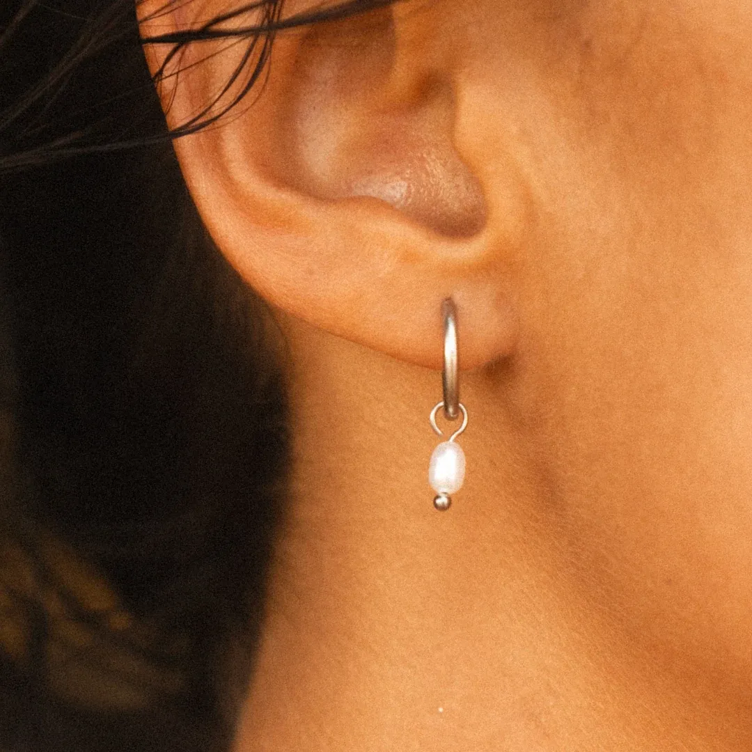 Pearl Huggie Hoops Gold - use view