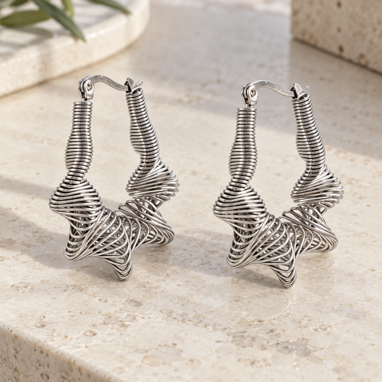 XM SEH0115S silver wire-wrapped star hoop earrings: lead view; styling props not included