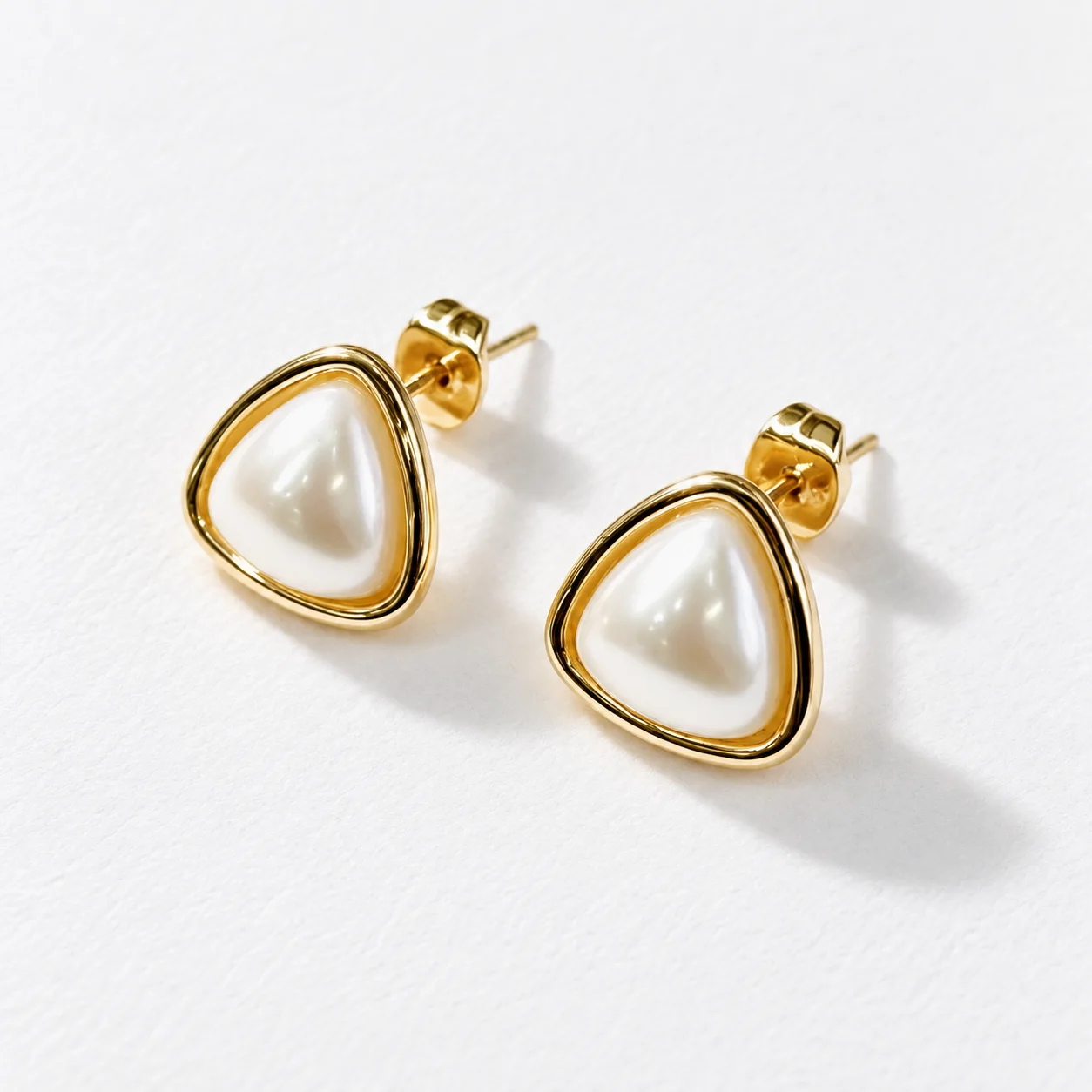 Pearl Triangle Studs with white imitation-pearl centers