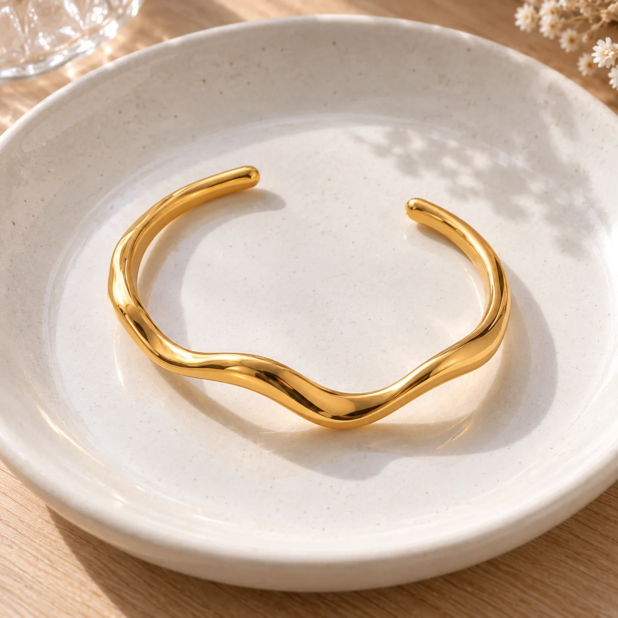 Gold-colored narrow wavy open stainless steel cuff JDB2405015: alternate view; other styling items not included
