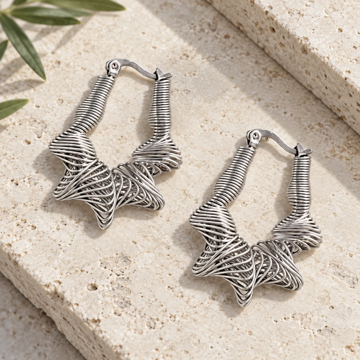 XM SEH0115S silver wire-wrapped star hoop earrings: alternate view; styling props not included