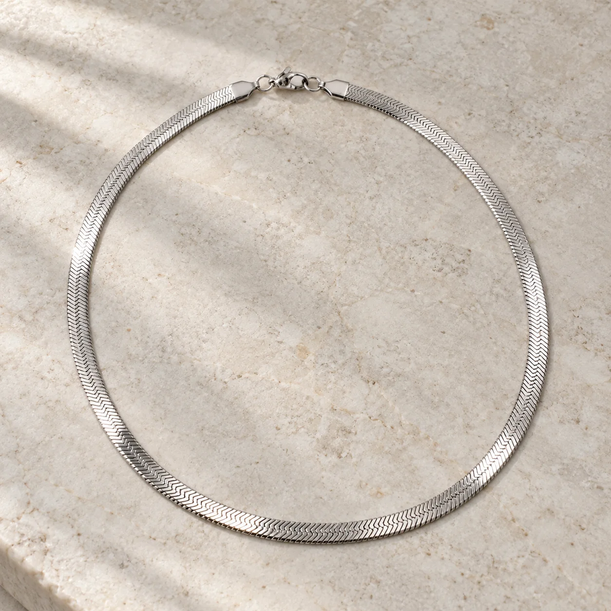 Flat herringbone stainless steel necklace: lead view